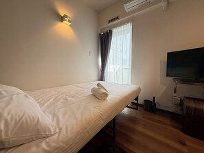 1 室のベッドルーム、WiFi (無料)、ベッドシーツ