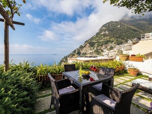 Casa exclusiva, vista al mar | Terraza o patio