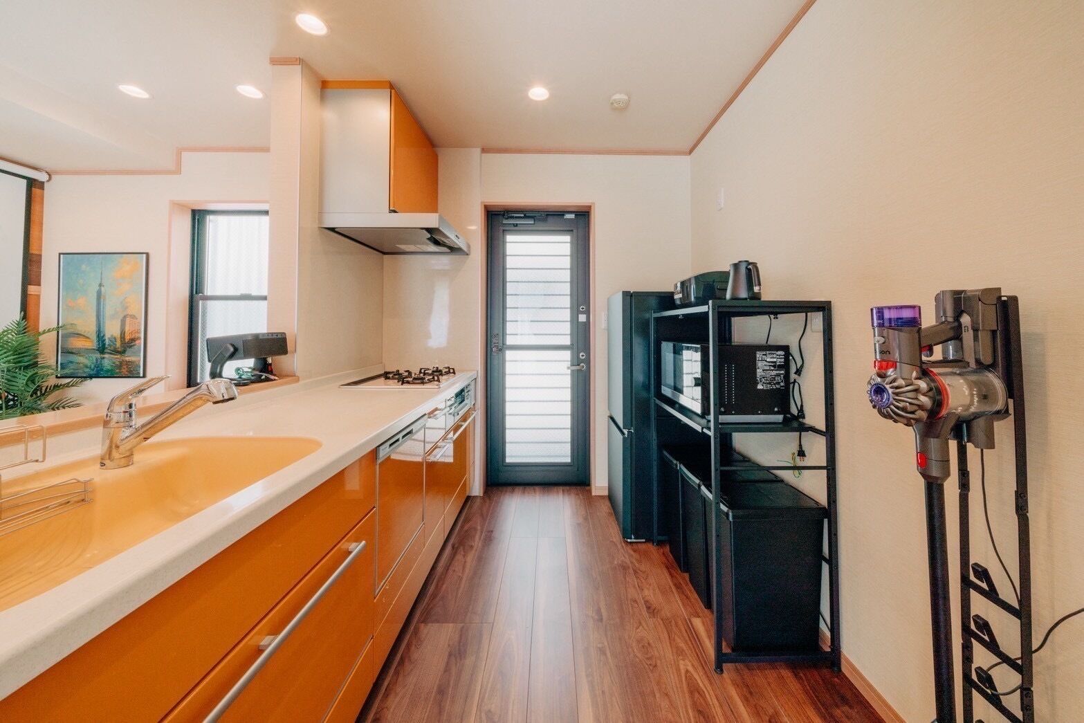 Fridge, microwave, stovetop, cookware/dishes/utensils