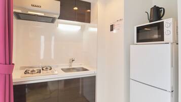 Fridge, microwave, stovetop, cookware/dishes/utensils