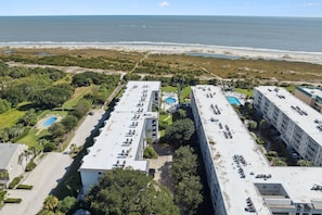 Exterior - Beachfront | Pool | Hot Tub | Balcony | Elevator | Beach Chairs | Covered Parking (St. Simons Island)