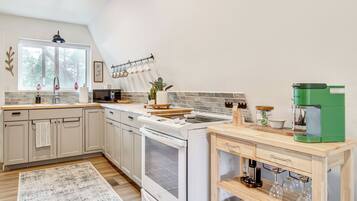 Fridge, microwave, stovetop, coffee/tea maker