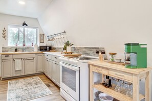 Fridge, microwave, stovetop, coffee/tea maker