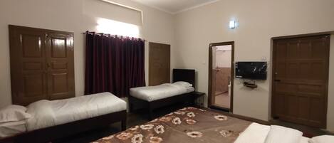 Deluxe driepersoonskamer | Gratis wifi, beddengoed