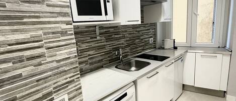 Microwave, stovetop, dishwasher, coffee/tea maker