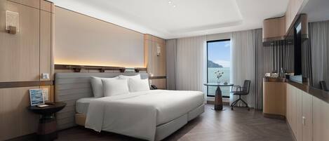 Deluxe Room, Ocean View | In-room safe, desk, soundproofing, iron/ironing board