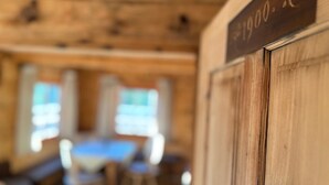 A wooden interior with a sign reading '1900 H'.