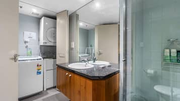 Shower, hair dryer, towels