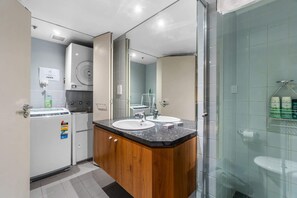 Shower, hair dryer, towels