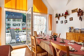 Dining - Double Room 11 – with Shower, WC, Mountain & Stream View, Balcony, and Wi-Fi (Hornberg)