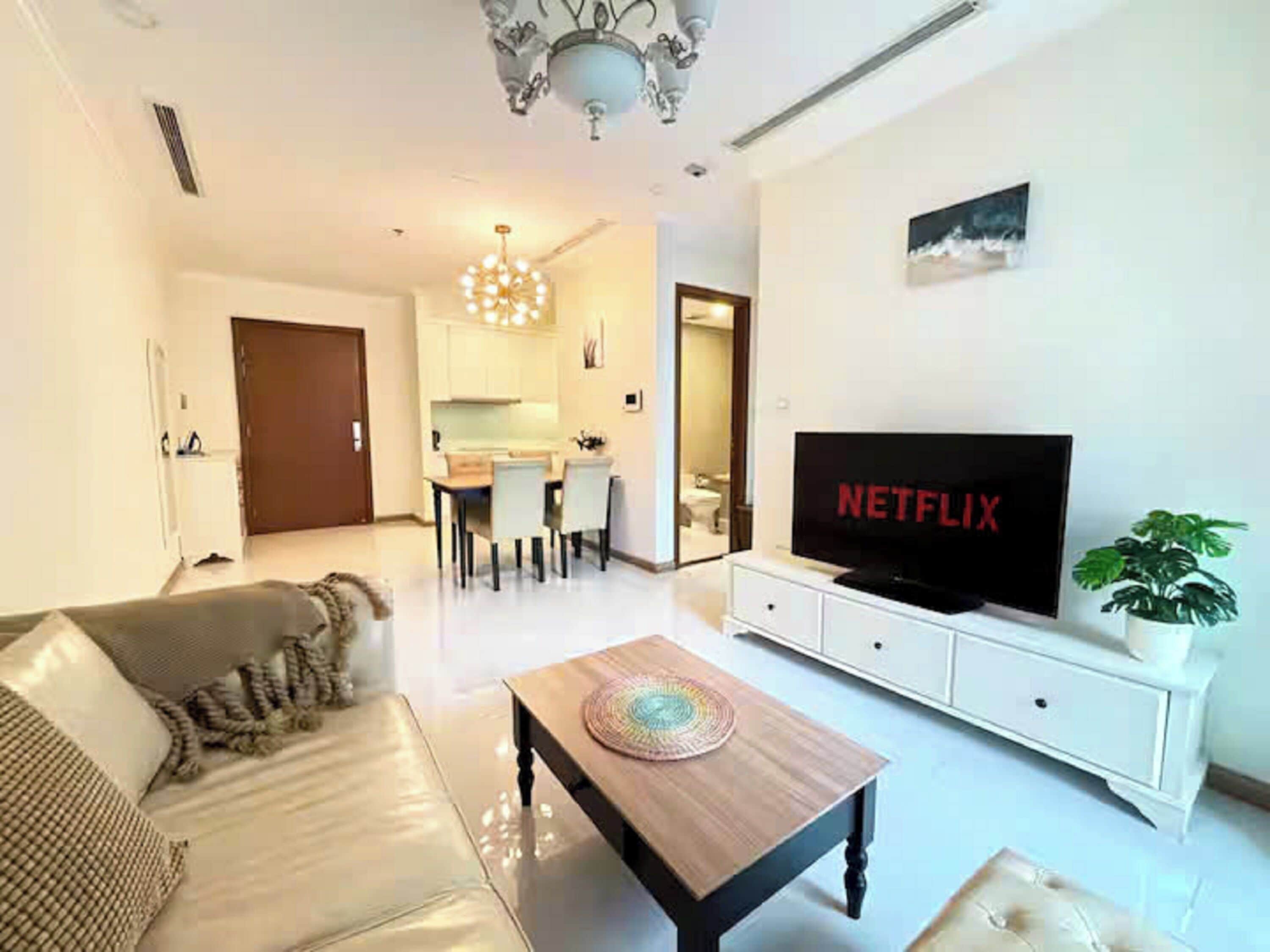 Grand Suite, 1 Bedroom, Club Lounge Access, City View | Living area | 65-inch Smart TV with cable channels, fireplace, Netflix