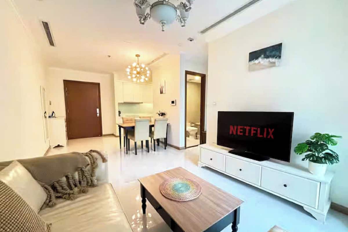 Grand Suite, 1 Bedroom, Club Lounge Access, City View | Living area | 65-inch Smart TV with cable channels, fireplace, Netflix
