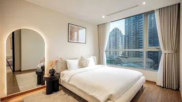 Family Suite, 3 Bedrooms, Club lounge access, City View | Egyptian cotton sheets, premium bedding, down duvets