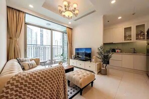 Presidential Suite, 2 Bedrooms, Club Lounge Access, City View | Living area | 65-inch Smart TV with cable channels, fireplace, Netflix - Luxeasy Style Landmark 81 (Ho Chi Minh)