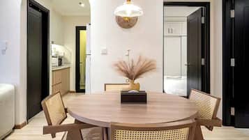Family Suite, 3 Bedrooms, Club lounge access, City View | In-room dining