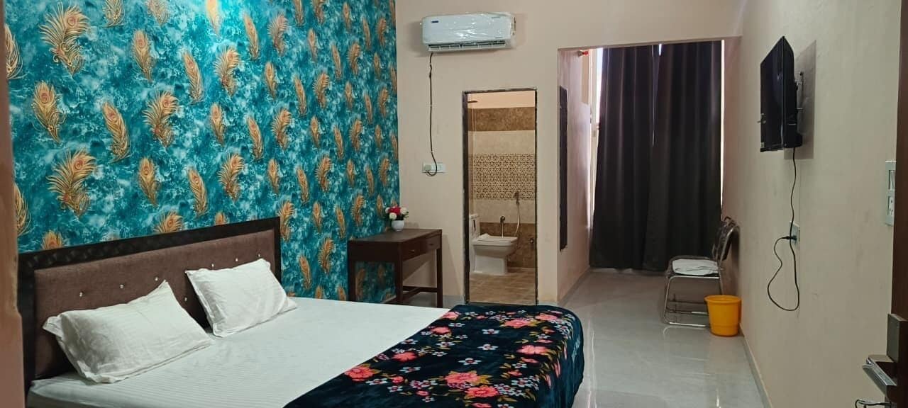 Habitación superior | Camas extra, wifi gratis y ropa de cama 