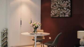 Luxury Studio Suite, City View | Living area | 49-inch Smart TV with cable channels
