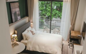 Luxury Studio Suite, City View | Premium bedding, individually decorated, individually furnished, desk - Centraltique Veranda Living (Hanoi)