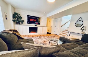 Smart TV, fireplace, books