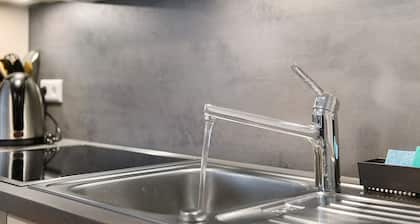 Appartement 'Haus Birkenösch' avec terrasse privée, jardin commun et Wi-Fi