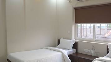 Comfort Double or Twin Room, City View | In-room safe, laptop workspace, iron/ironing board