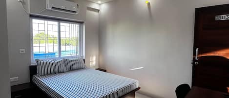 In-room safe, desk, laptop workspace, iron/ironing board