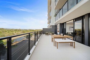 Outdoor dining - The Corso: Sophisticated Living | Waterway Views (Maroochydore Region)