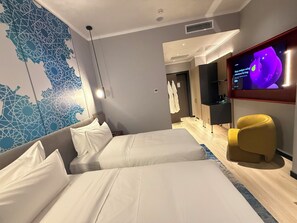 Twin Room, Courtyard View | In-room safe, blackout drapes, iron/ironing board, free WiFi