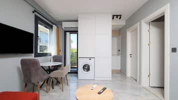 Suite Deluxe, balcon | Coin séjour