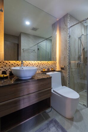 Shower, hair dryer, towels, soap