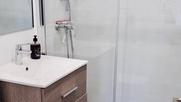 Hair dryer, towels, soap, toilet paper