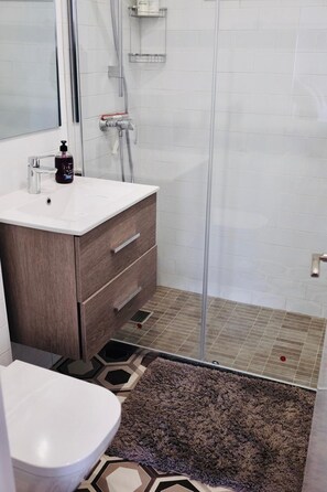 Hair dryer, towels, soap, toilet paper