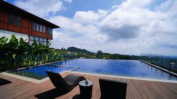 2 outdoor pools, pool umbrellas, sun loungers