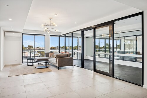 Cannington Comfort – Beside Carousel & Curtin, featuring modern design and rooftop amenities.