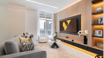 Luxury Apartment, Balcony, Marina View | Living area | 65-inch Smart TV with satellite channels