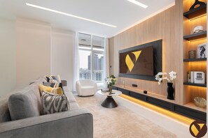 Luxury Apartment, Balcony, Marina View | Living area | 65-inch Smart TV with satellite channels