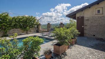 Seasonal outdoor pool, pool umbrellas, sun loungers