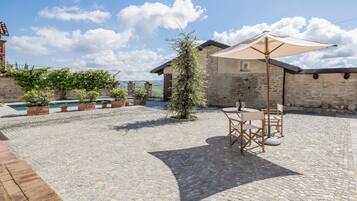 Seasonal outdoor pool, pool umbrellas, sun loungers