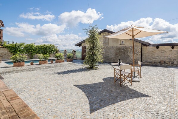 Seasonal outdoor pool, pool umbrellas, sun loungers