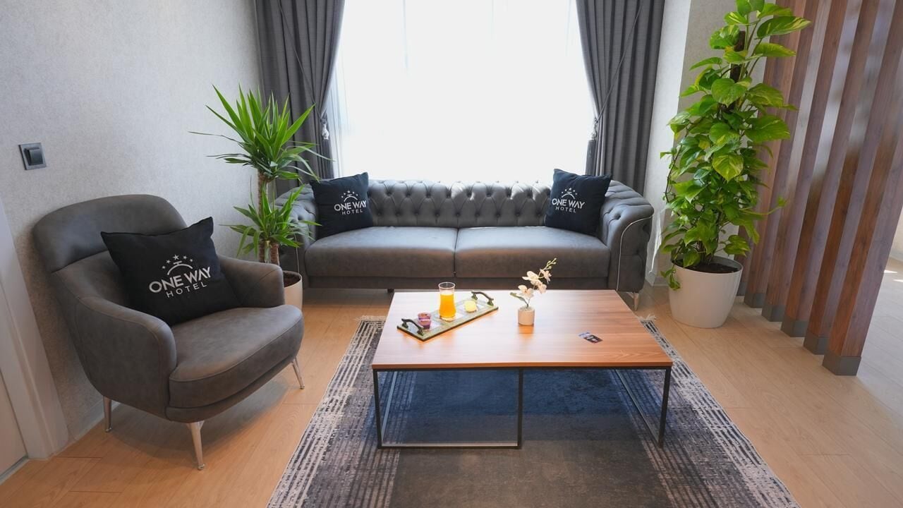 Suite Deluxe, vue sur la montagne | Espace de travail pour ordinateurs portables, fer et planche à repasser