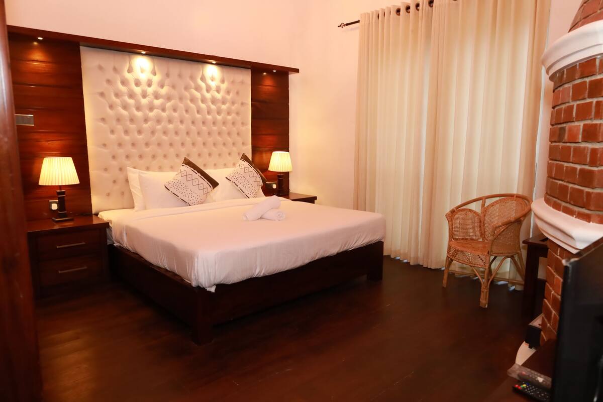 Deluxe Double Room, Balcony, Garden View | Desk, laptop workspace, free WiFi