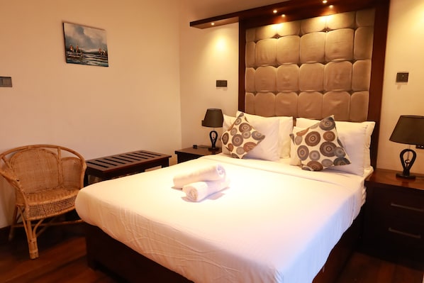 Habitación doble familiar, vista al jardín | Escritorio, espacio para trabajar con laptop y wifi gratis