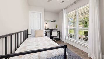 4 bedrooms, desk, iron/ironing board, travel crib