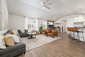 TV, fireplace, books, offices