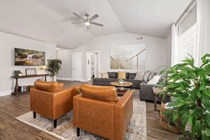 TV, fireplace, books, offices