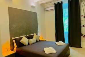 2 habitaciones, tabla de planchar con plancha, wifi y ropa de cama 