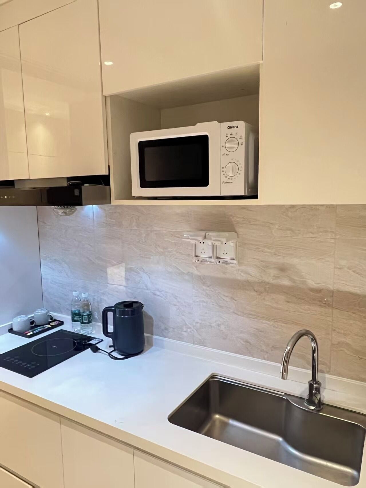 Mini-fridge, microwave, cookware/dishes/utensils