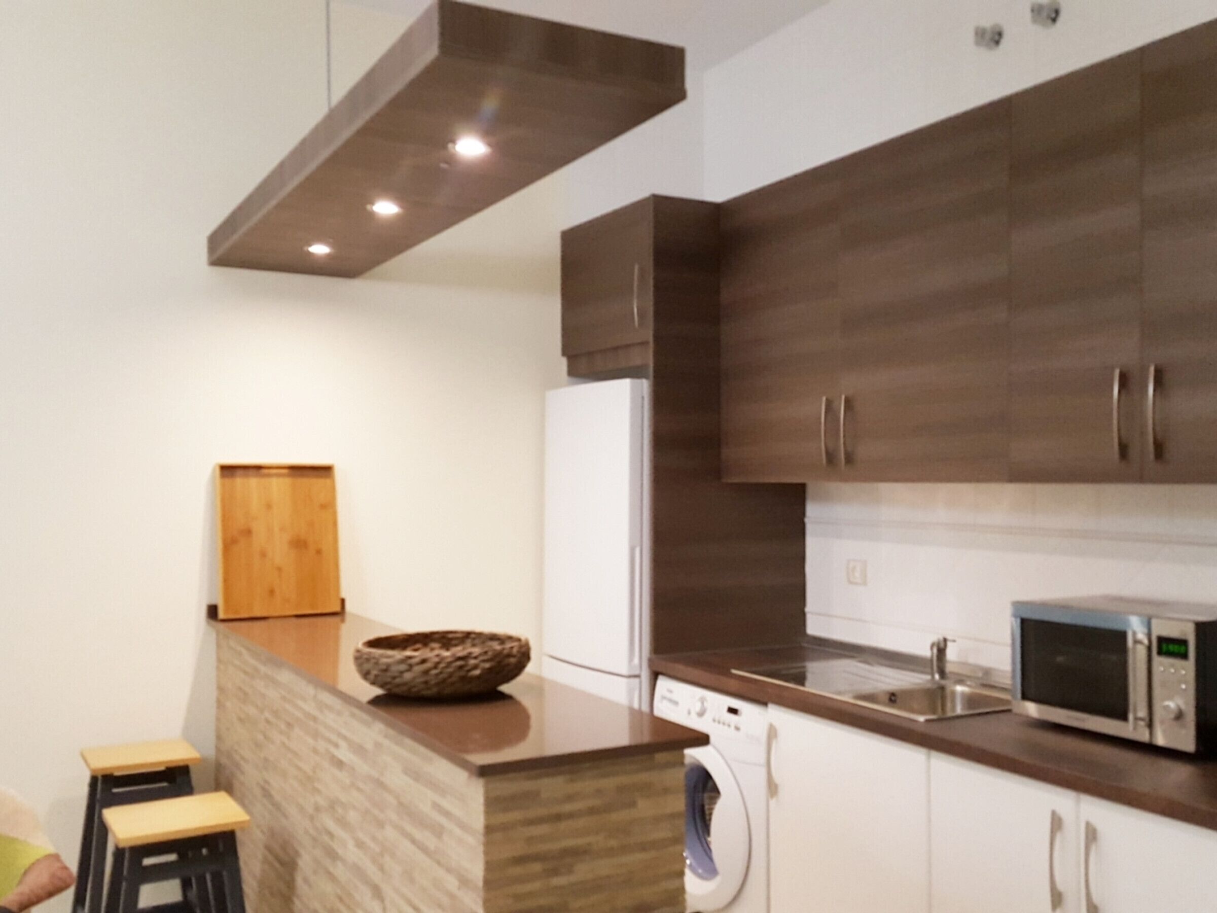 Fridge, microwave, coffee/tea maker, toaster