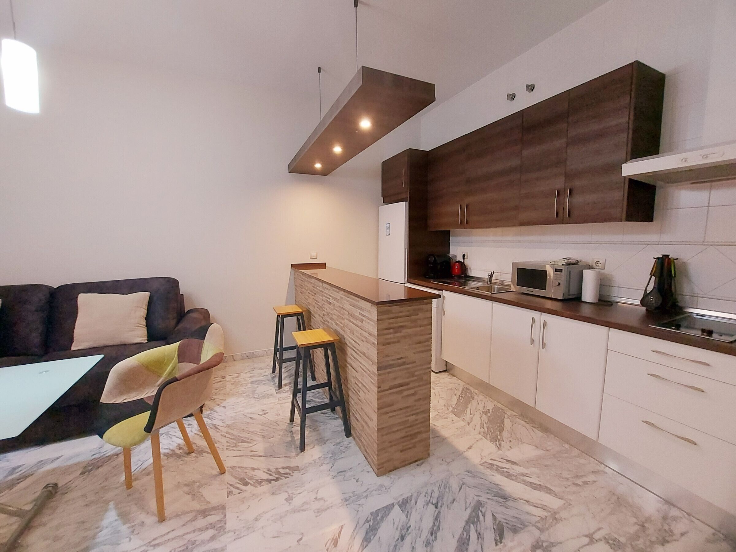 Fridge, microwave, coffee/tea maker, toaster