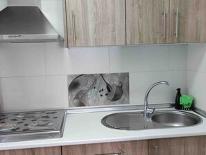 Fridge, microwave, coffee/tea maker, toaster
